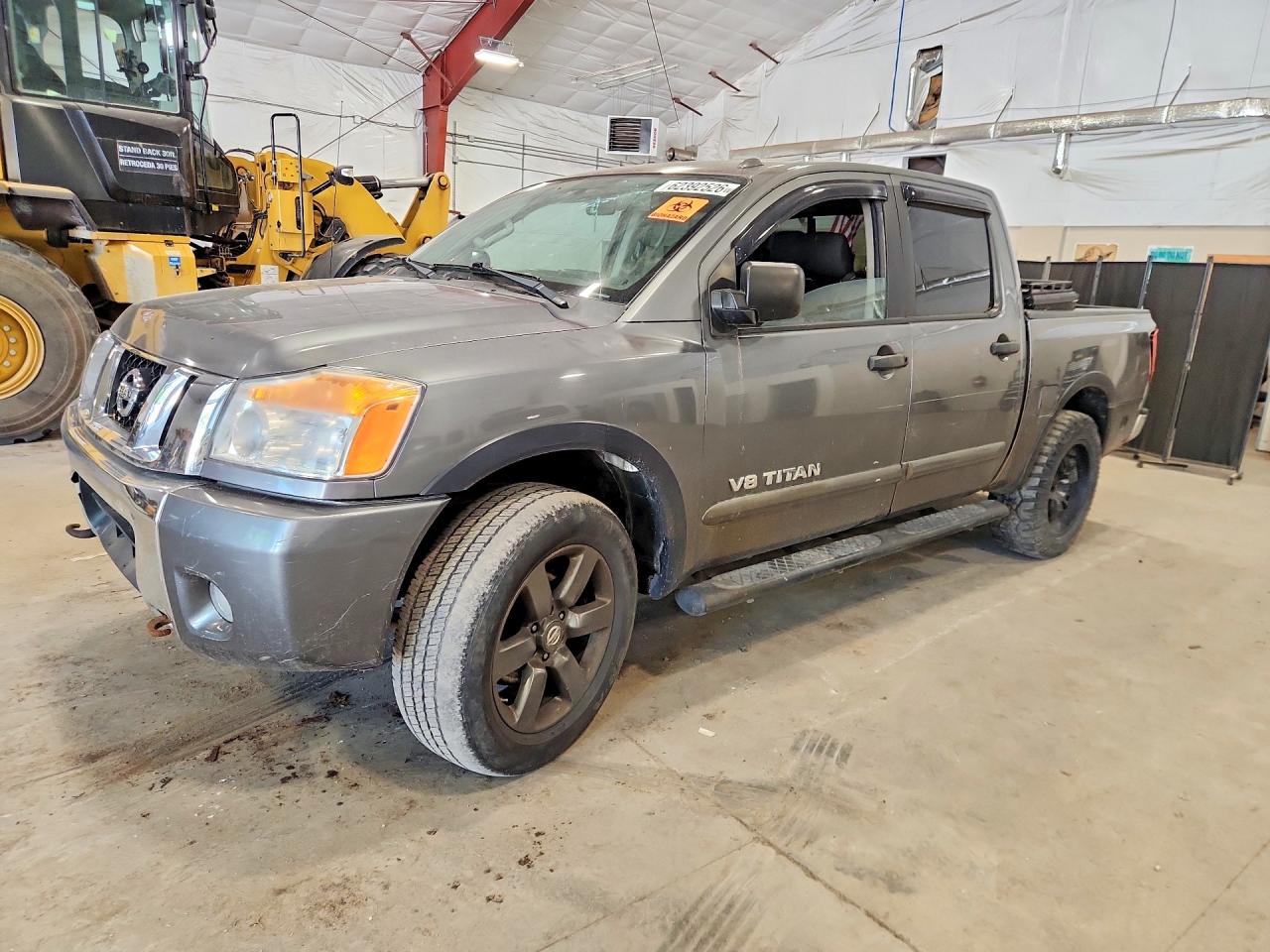 2015 Nissan Titan SL, VIN 1N6AA0ECXFN506285 — Rear end