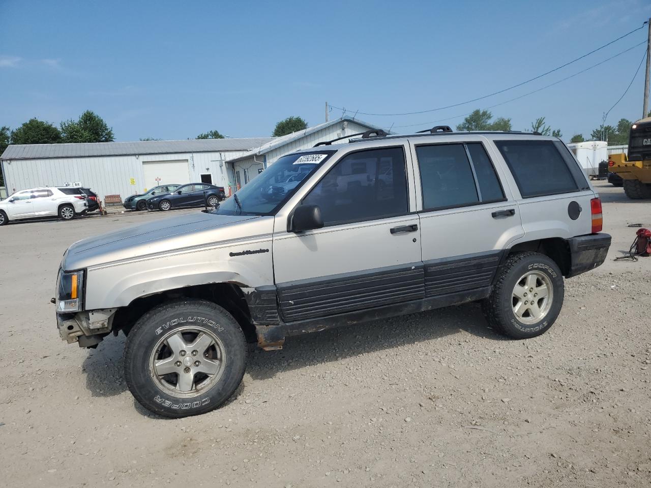 1994 Jeep Grand Cherokee Limited, VIN 1J4GZ78S1RC206288 — Side