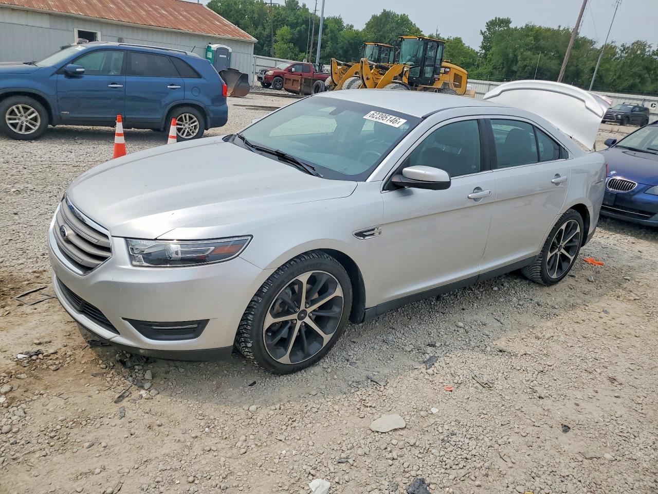2016 Ford Taurus SEL, VIN 1FAHP2E86GG142692 — Зад