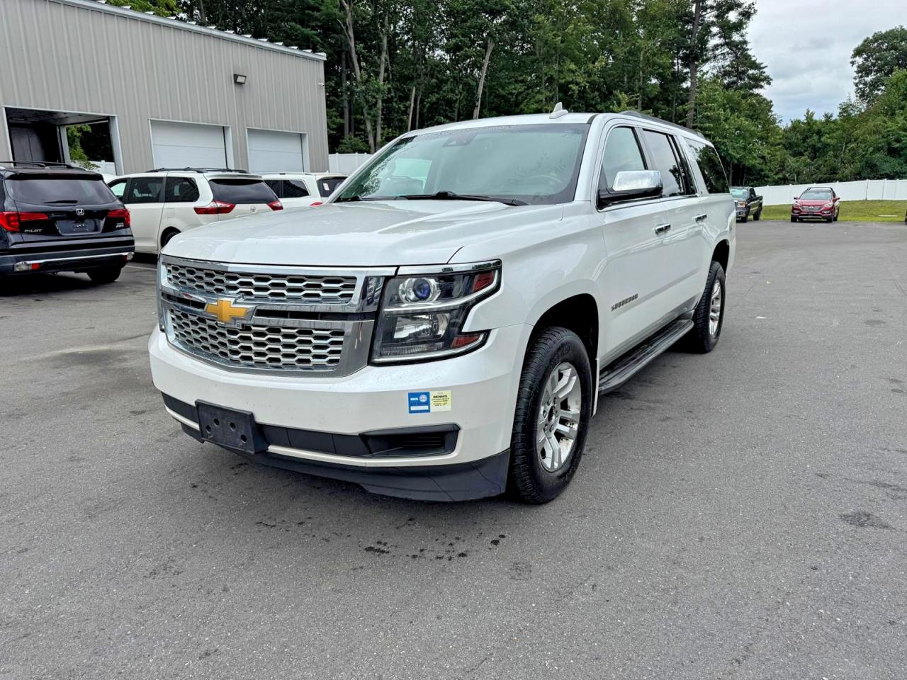2016 Chevrolet Suburban LT, VIN 1GNSKHKC5GR239498 — Minor dents and scratches