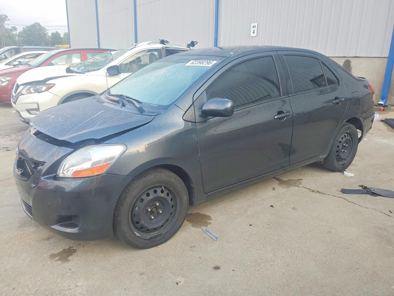 2011 Toyota Yaris, VIN JTDBT4K34B1401465 — Front end
