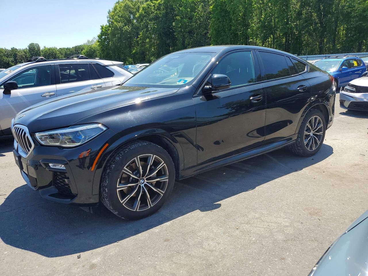 2020 BMW X6 xDrive40i, VIN 5UXCY6C01L9D04637 — Side