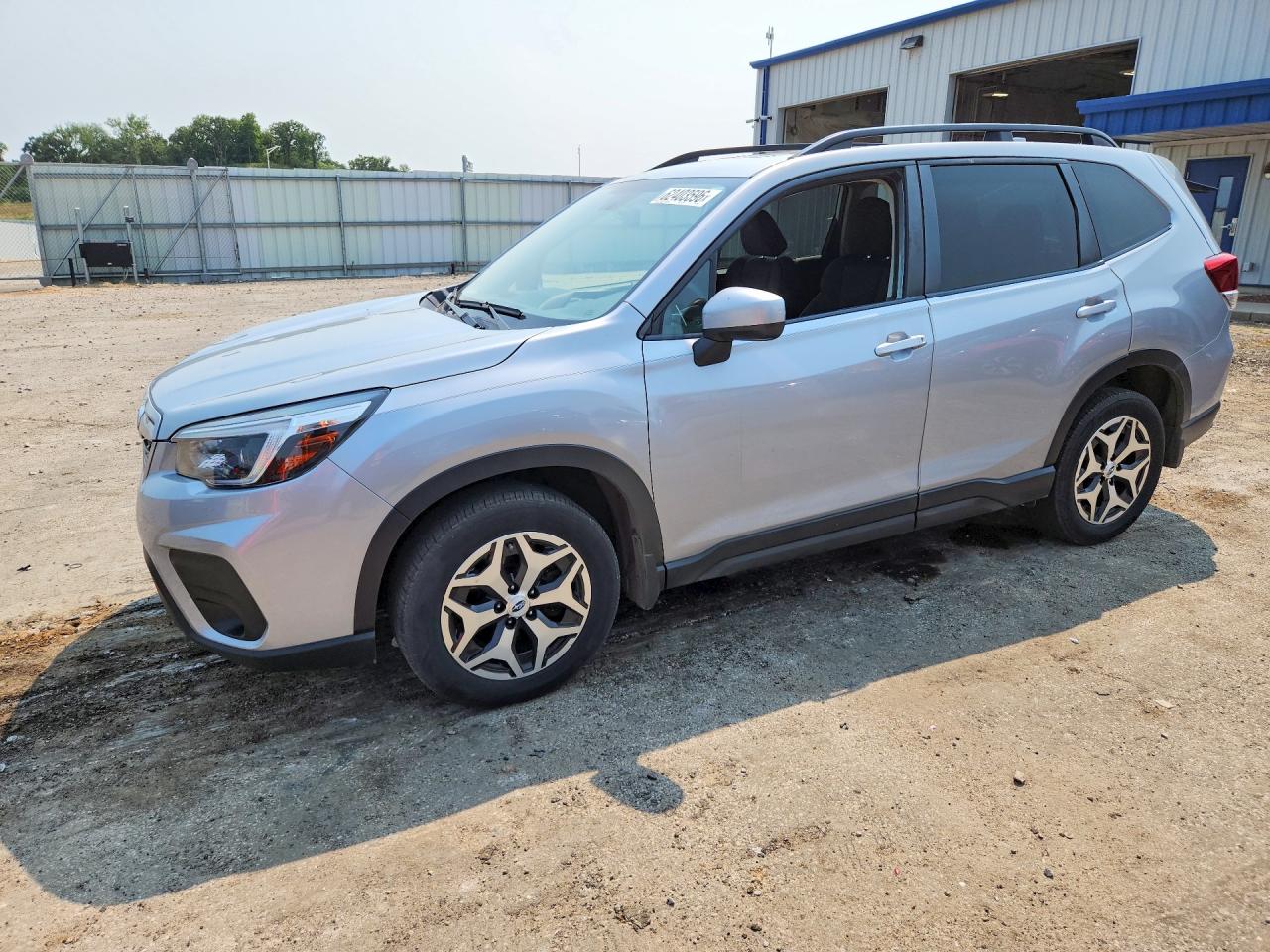 2021 Subaru Forester Premium, VIN JF2SKAFC8MH409818 — Hail