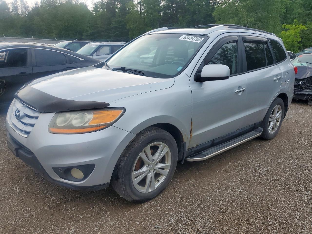2010 Hyundai Santa Fe SE, VIN 5NMSHDAG7AH407111 — Minor dents and scratches