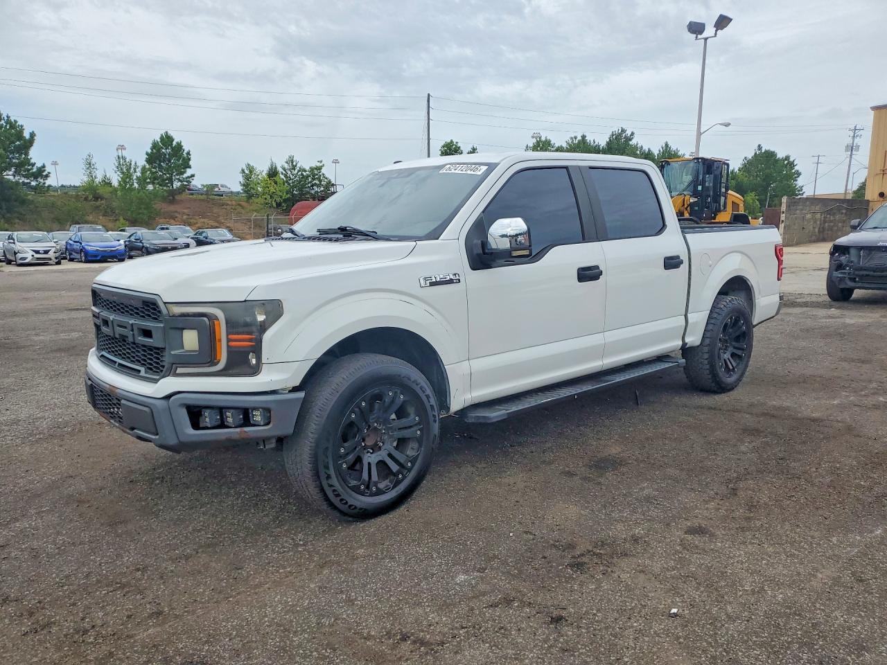 2019 Ford F-150 XLT, VIN 1FTEW1CB0KFD16523 — Minor dents and scratches