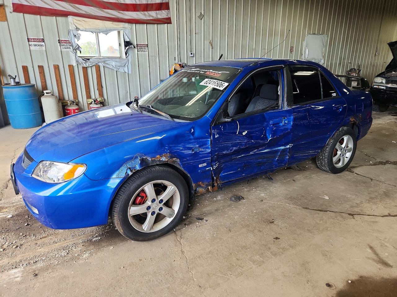 2003 Mazda Protege DX, VIN JM1BJ225231158946 — Side