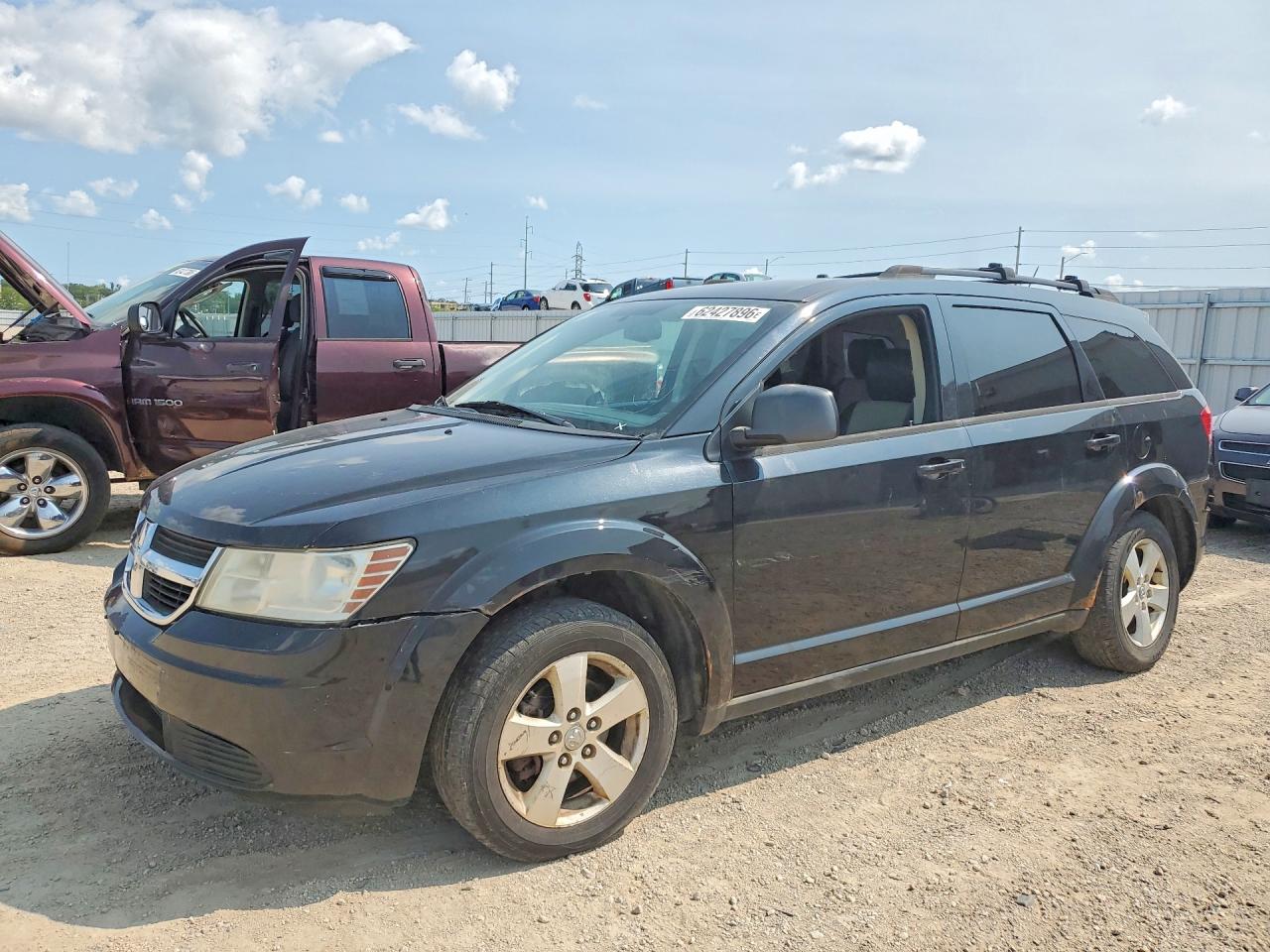 2009 Dodge Journey SXT, VIN 3D4GG57V79T590094 — Град