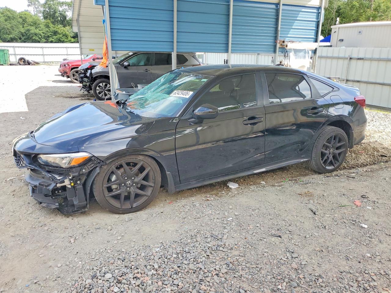 2026 Honda Civic Sport, VIN 2HGFE2F51TH579186 — Бок