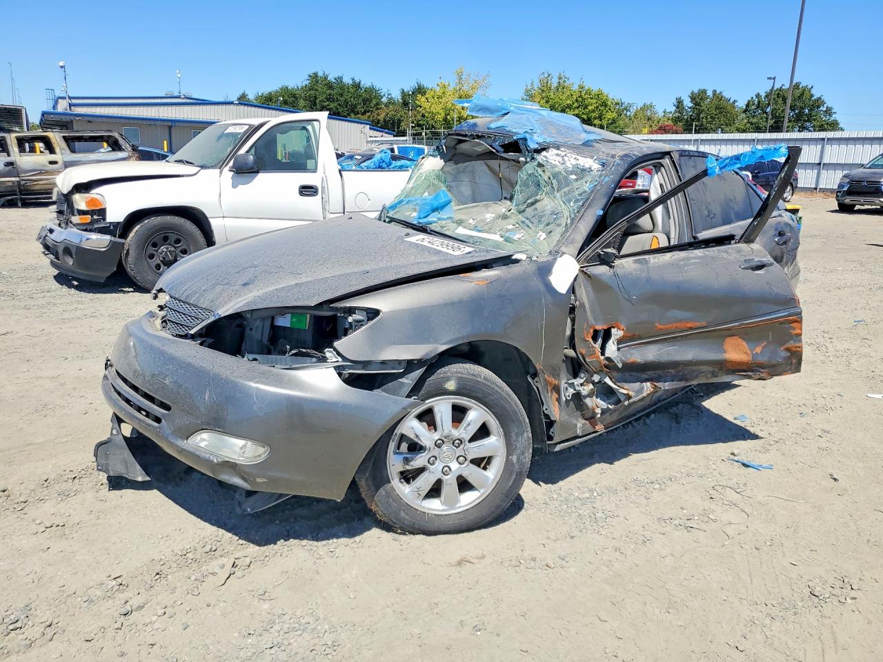 2003 Toyota Camry XLE, VIN JTDBF30K630150144 — Rollover