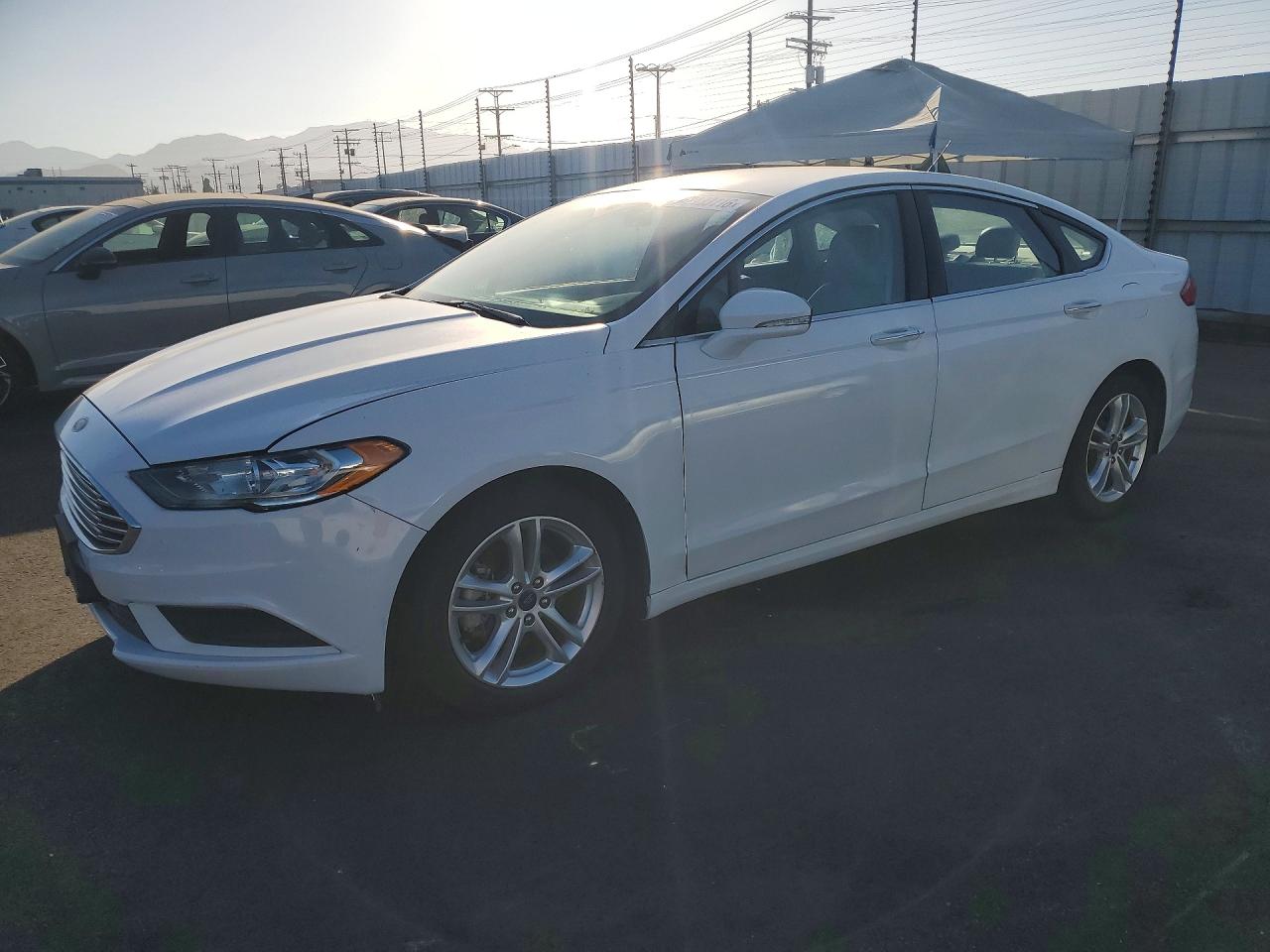 2018 Ford Fusion SE, VIN 3FA6P0LU7JR221798 — Prior damage history
