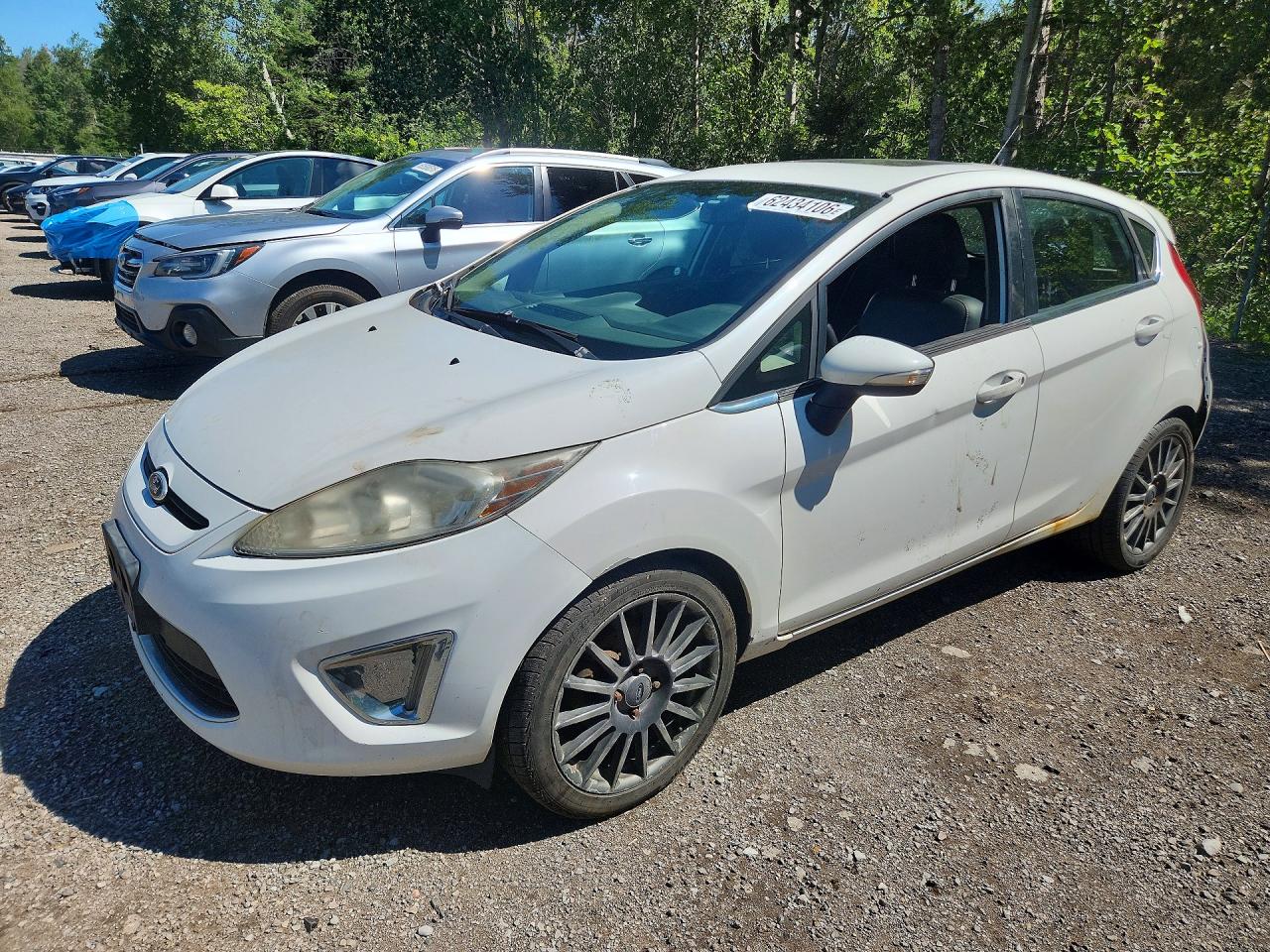 2011 Ford Fiesta SES, VIN 3FADP4FJ5BM126350 — Rear end