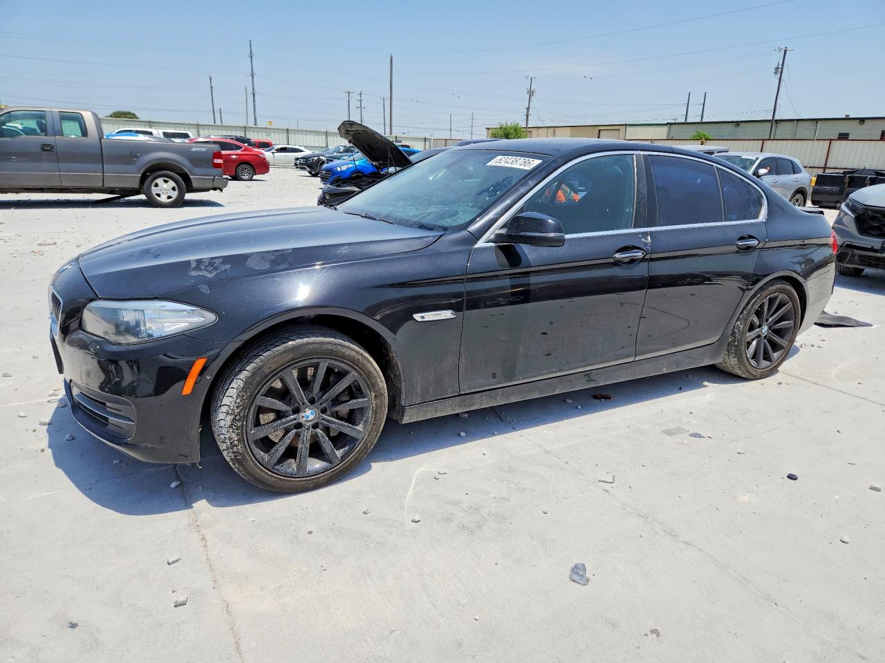 2014 BMW 5 Series 535i, VIN WBA5B1C5XED480252 — Side