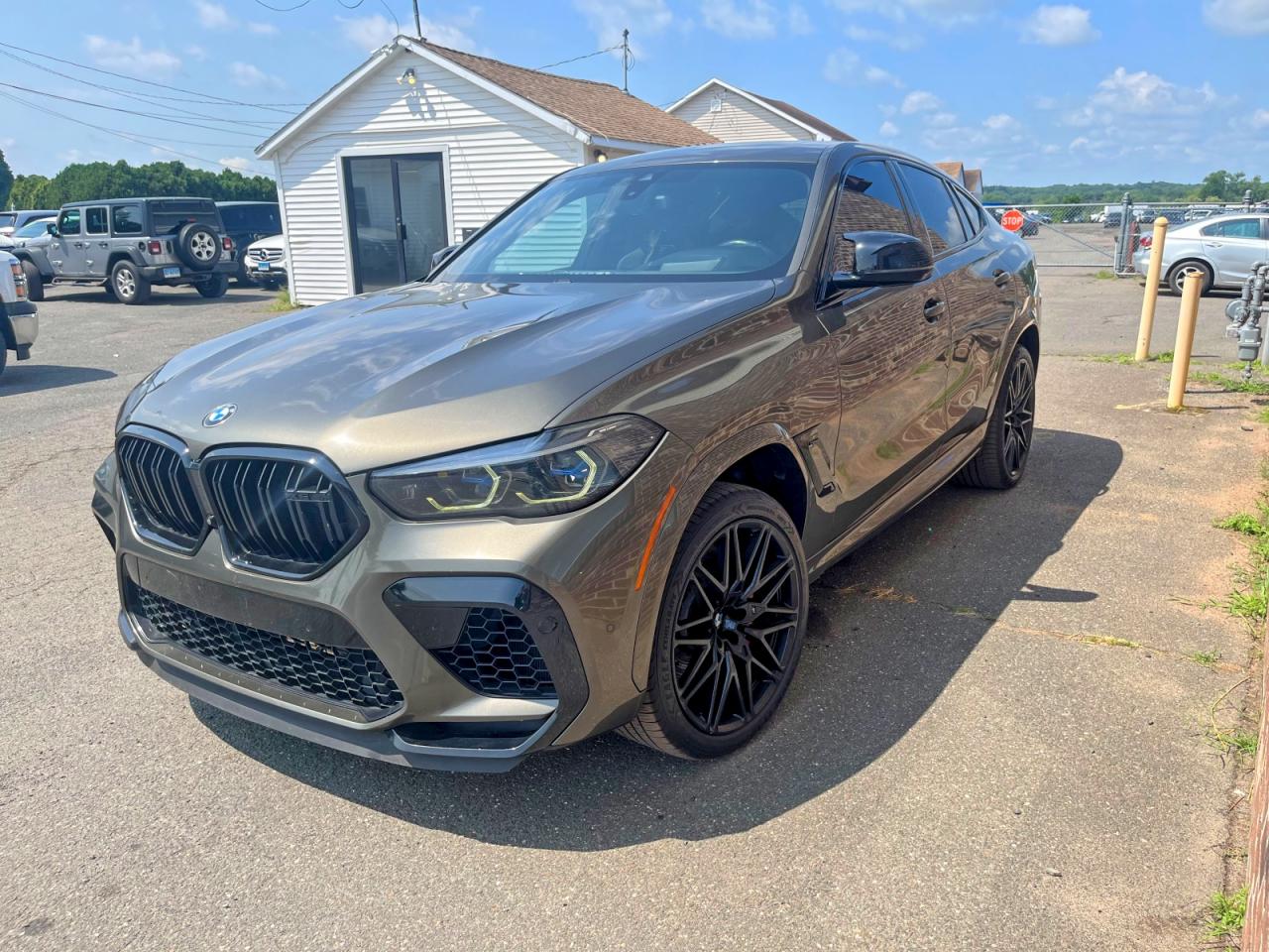 2022 BMW X6 M, VIN 5YMCY0C03N9J76956 — Minor dents and scratches