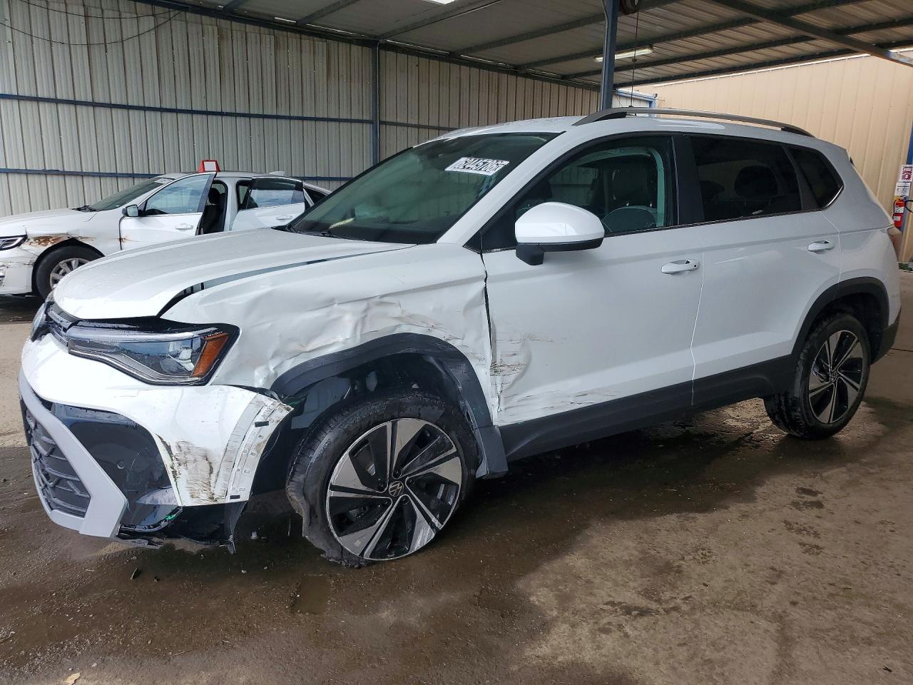 2026 Volkswagen Taos SE, VIN 3VVUC7B28TM076911 — Front end