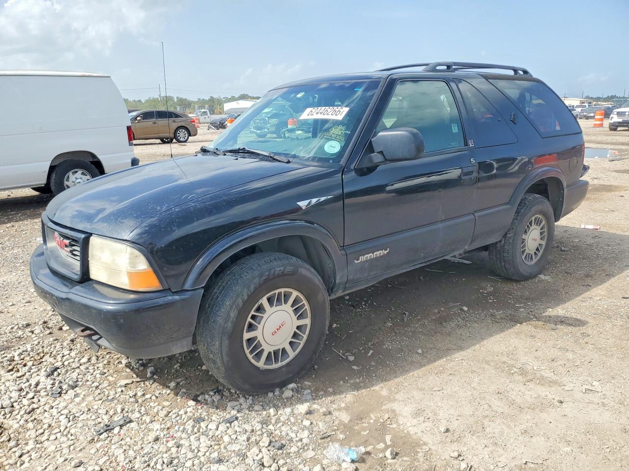2000 GMC Jimmy SL, VIN 1GKCT18WXYK199095 — Зад