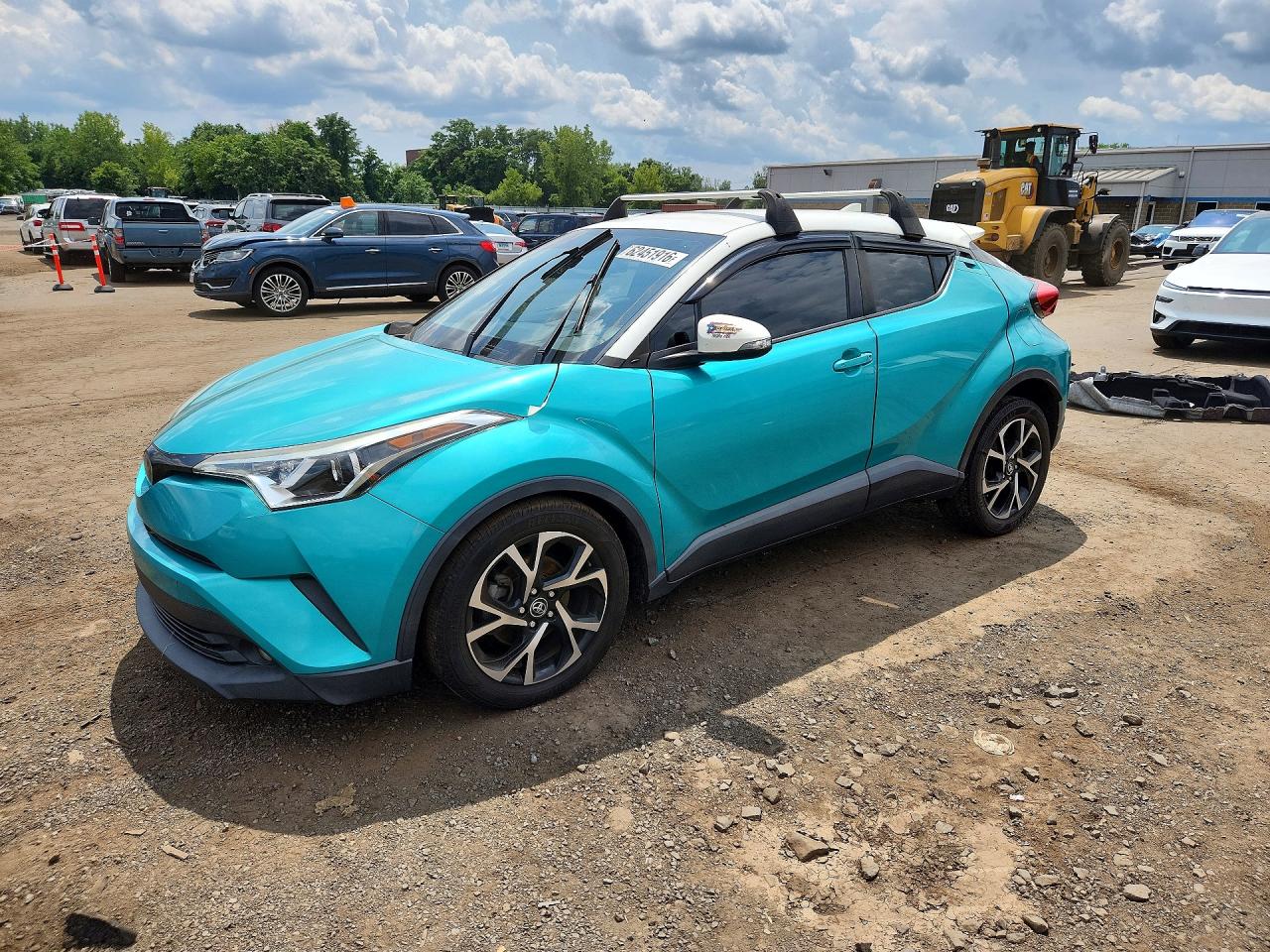 2018 Toyota C-HR XLE Premium, VIN JTNKHMBX7J1010700 — Water / flood