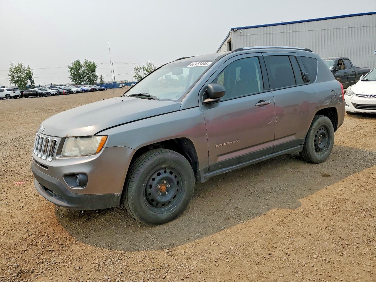 2012 Jeep Compass North, VIN 1C4NJDABXCD523064 — Side