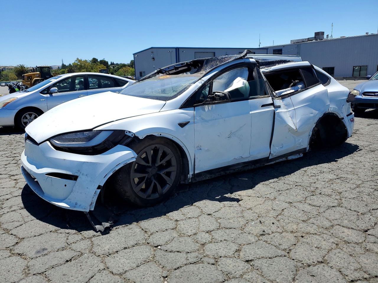 2023 Tesla Model X, VIN 7SAXCDE52PF378790 — Rollover