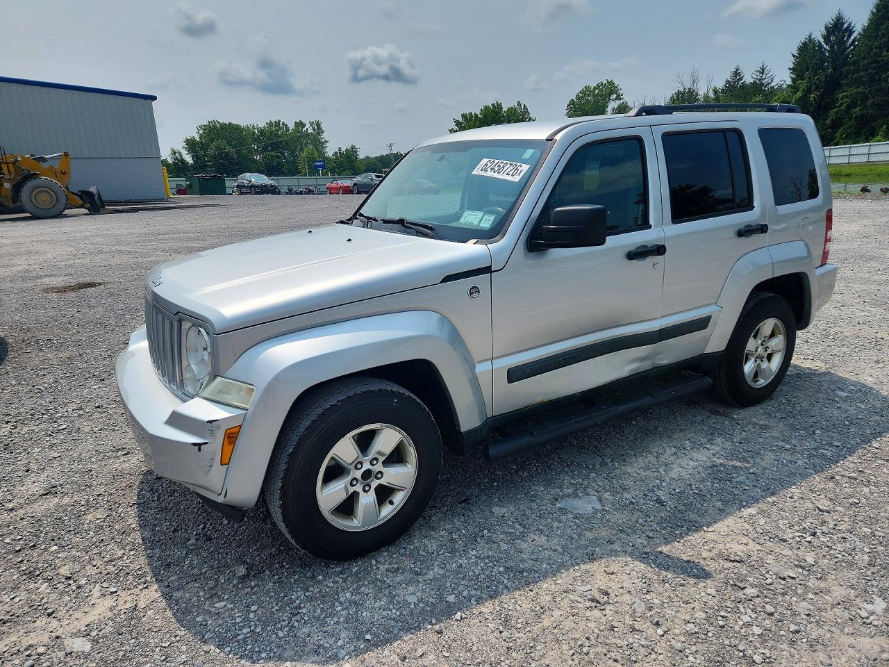 2012 Jeep Liberty Sport, VIN 1C4PJMAK7CW130832 — Бок