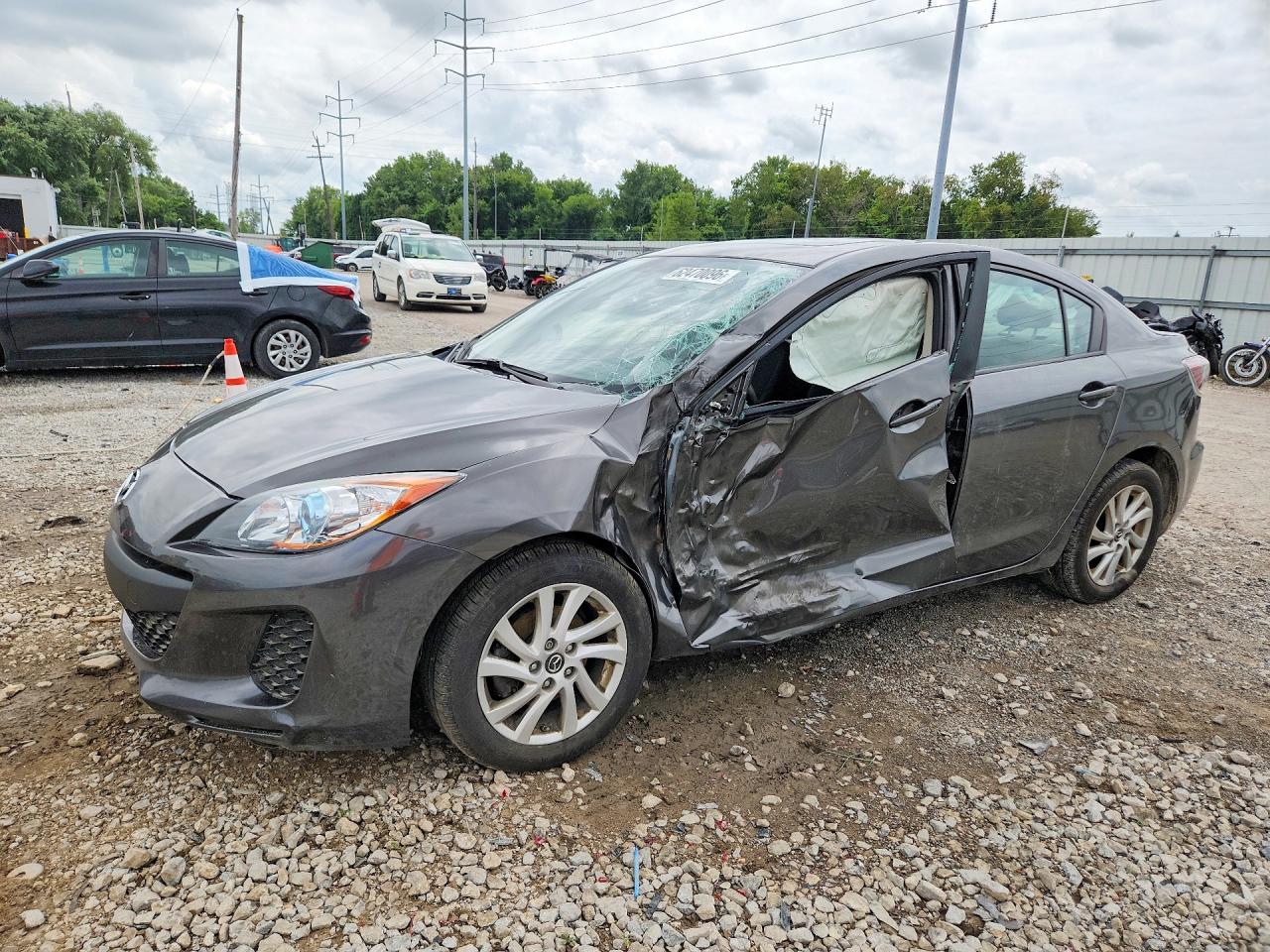 2013 Mazda 3 i Touring, VIN JM1BL1V72D1716829 — Side