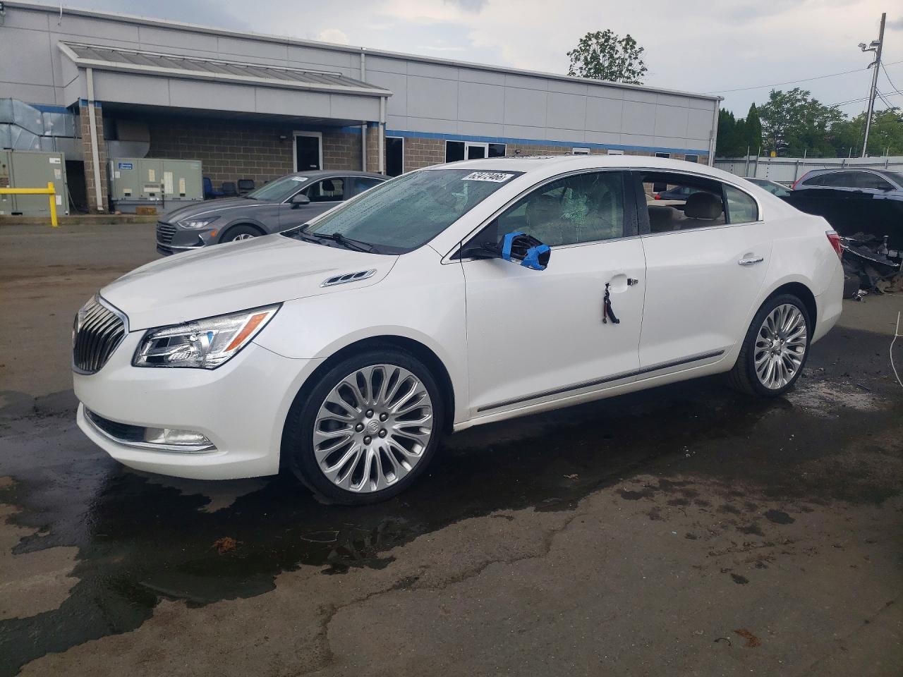 2015 Buick LaCrosse Premium II, VIN 1G4GF5G39FF203173 — Vandalism
