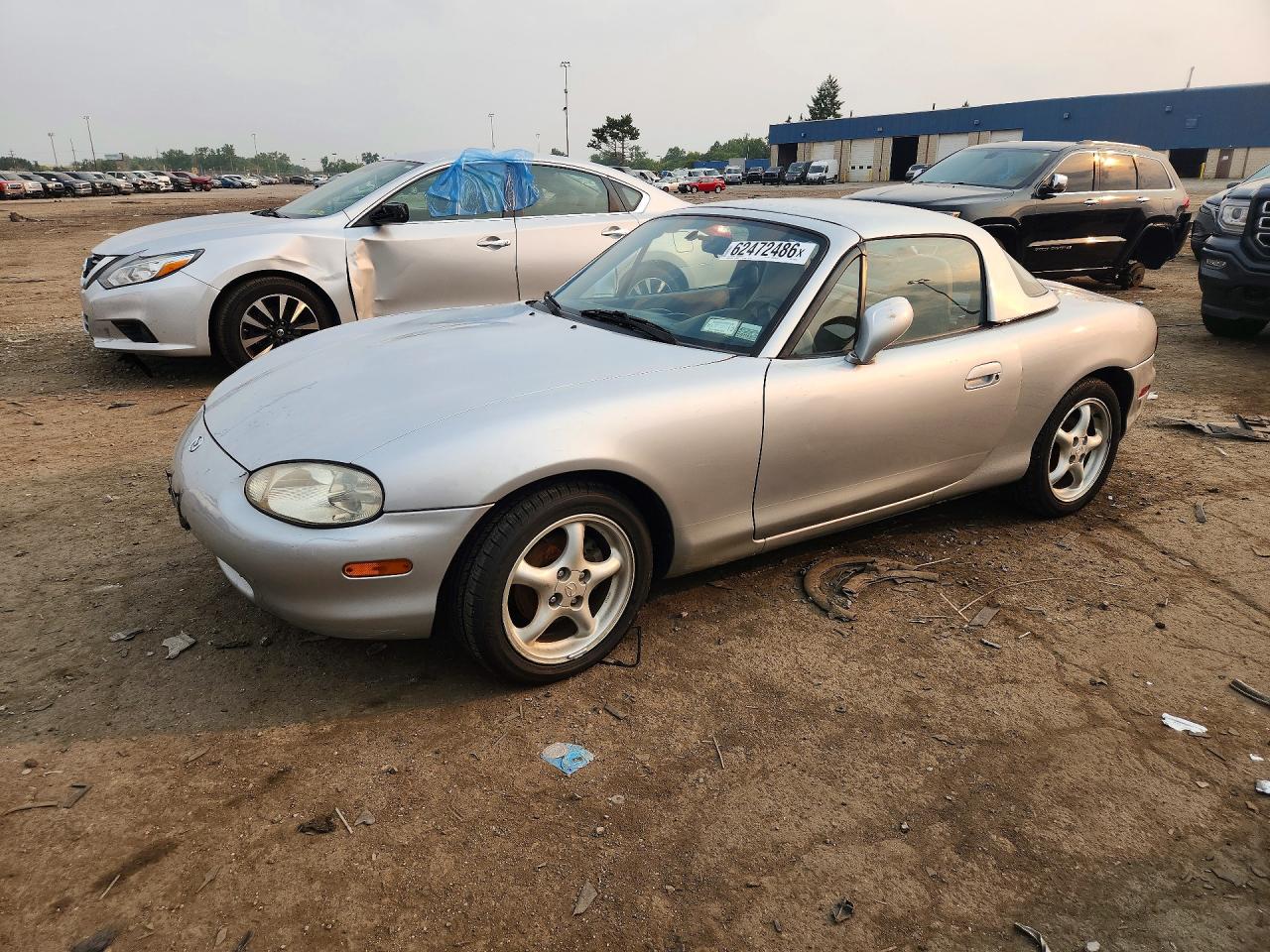 1999 Mazda MX-5 Miata, VIN JM1NB3539X0103013 — Minor dents and scratches