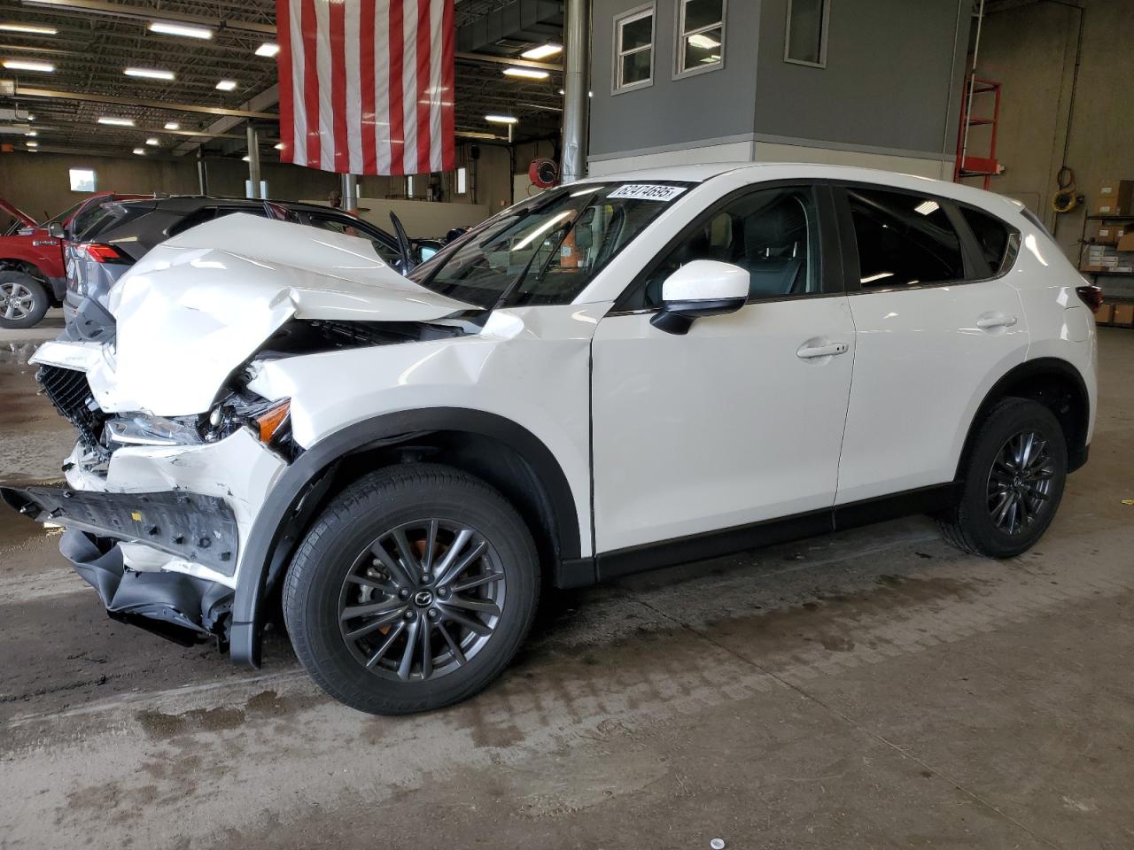 2021 Mazda CX-5 Touring, VIN JM3KFBCM4M0372164 — Front end