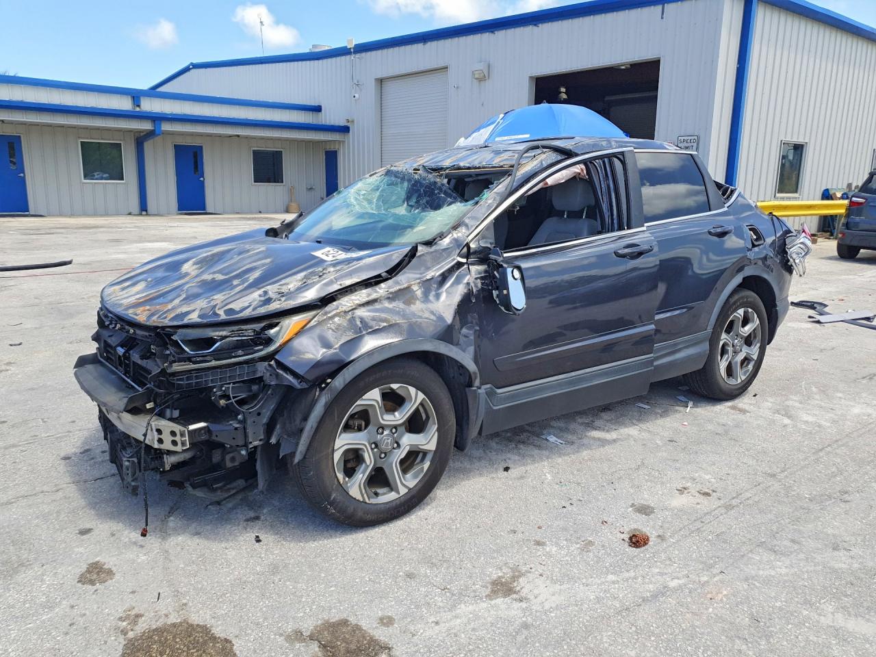 2017 Honda CR-V EX-L, VIN 7FARW1H89HE037720 — Rollover