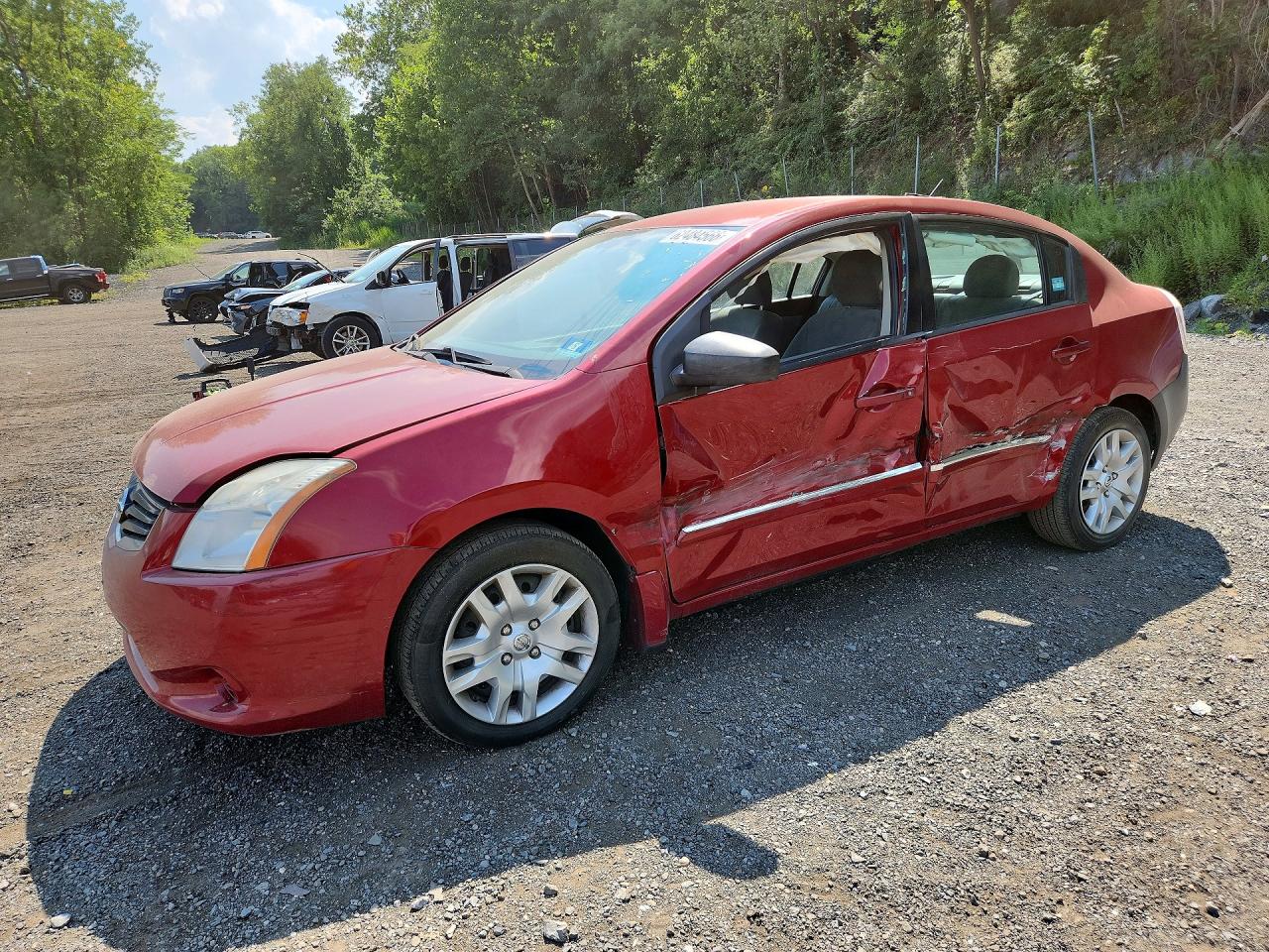 2010 Nissan Sentra S, VIN 3N1AB6AP5AL634442 — Бок