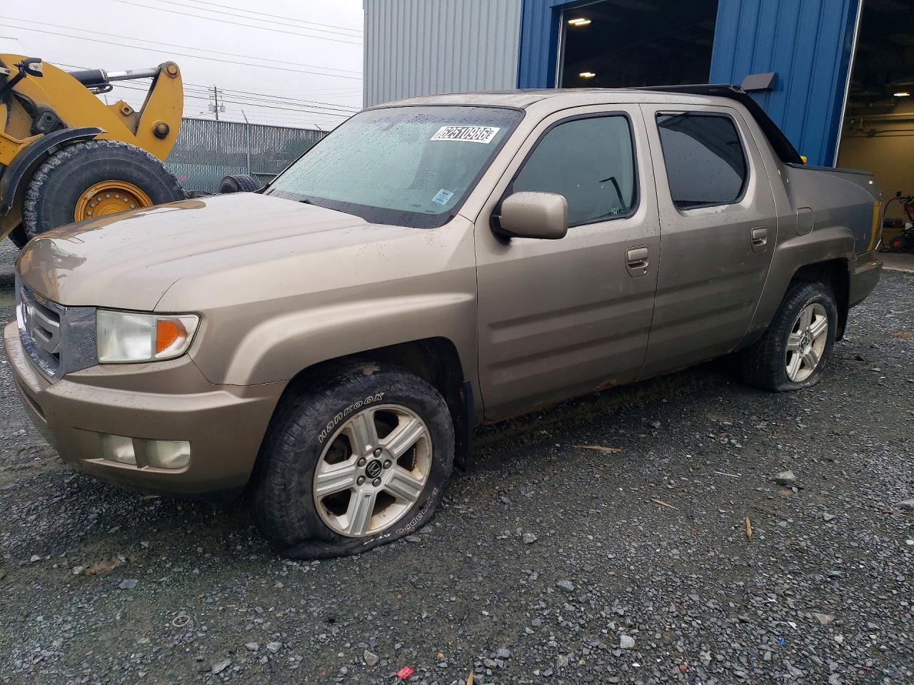 2010 Honda Ridgeline RTL, VIN 5FPYK1F57AB501449 — Rear end