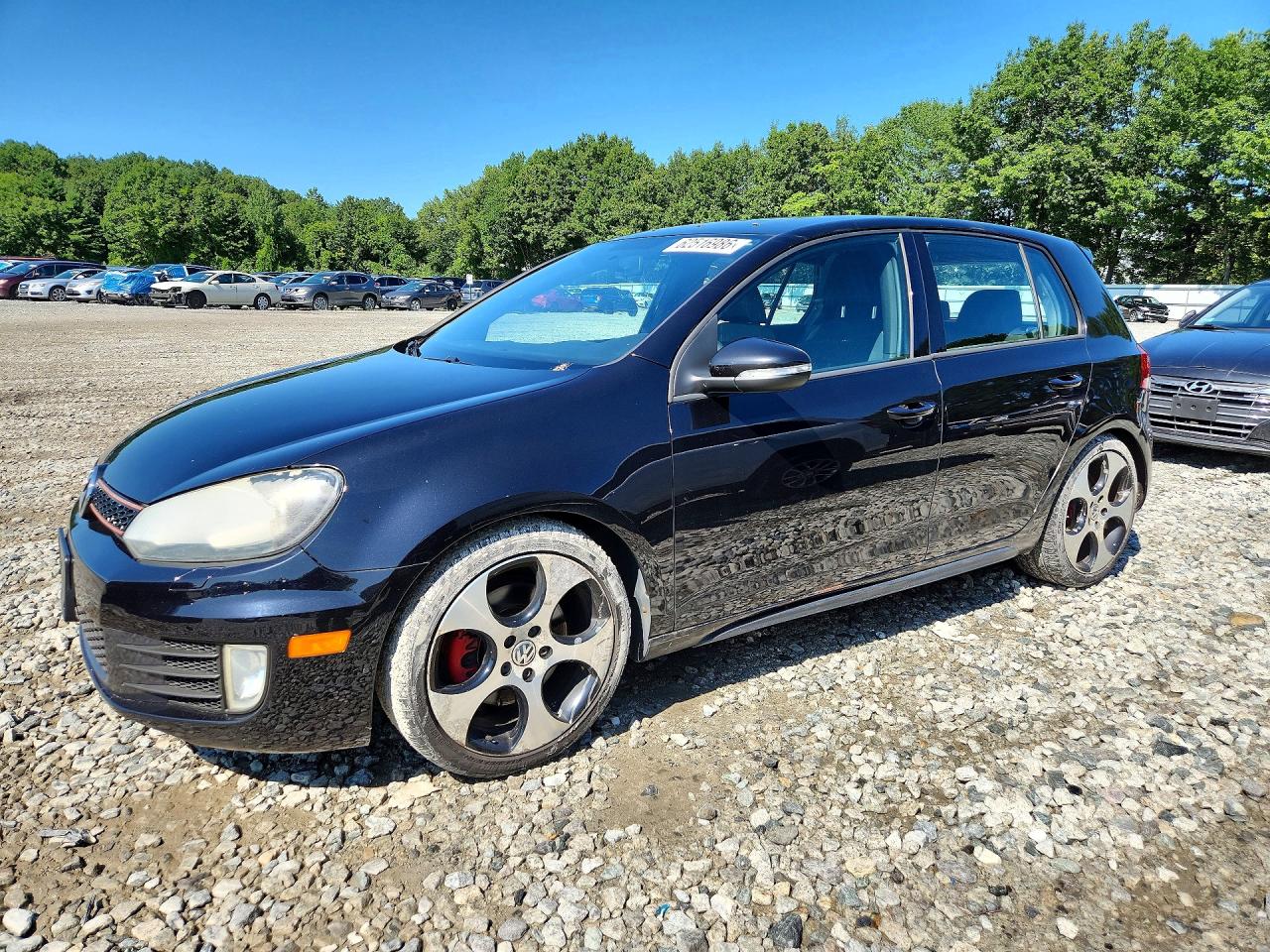 2012 Volkswagen Golf GTI PZEV, VIN WVWGD7AJ8CW223004 — Side