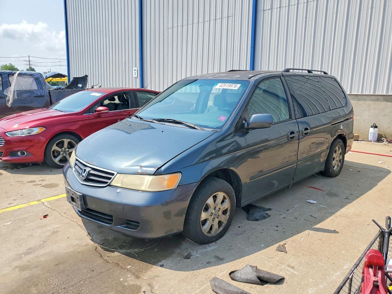 2003 Honda Odyssey EX, VIN 5FNRL18693B019326 — Бок