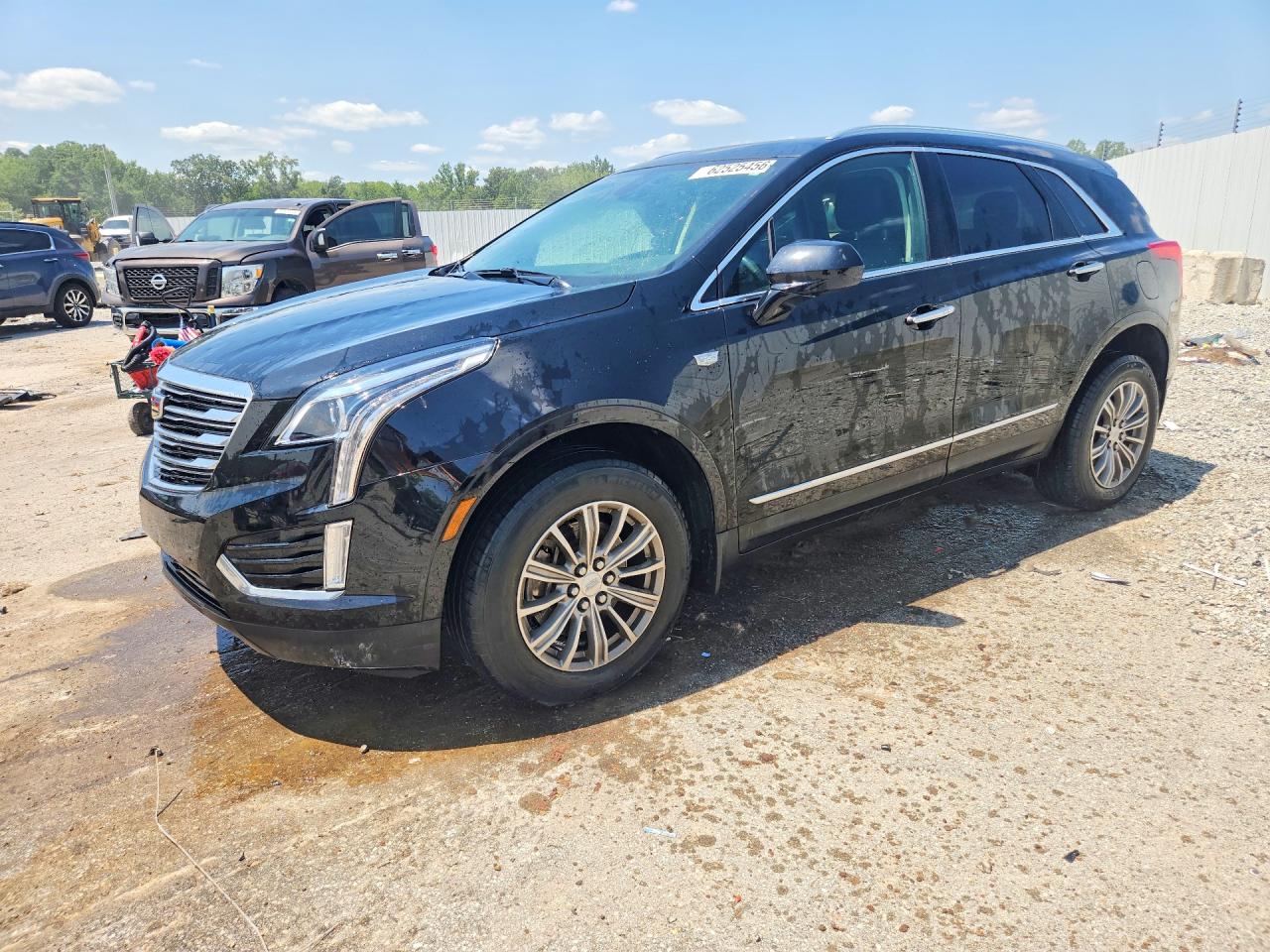 2019 Cadillac XT5 Luxury FWD, VIN 1GYKNCRSXKZ212669 — Hail