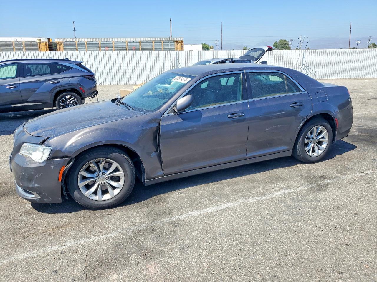 2015 Chrysler 300 Limited, VIN 2C3CCAAG9FH766386 — Front end