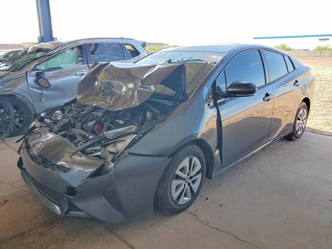 2017 Toyota Prius Three Touring, VIN JTDKARFUXH3039712 — Front end