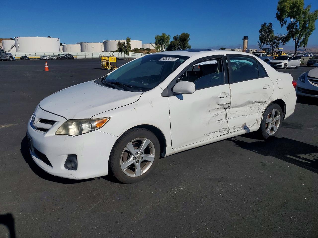 2011 Toyota Corolla LE, VIN 2T1BU4EEXBC558973 — Side
