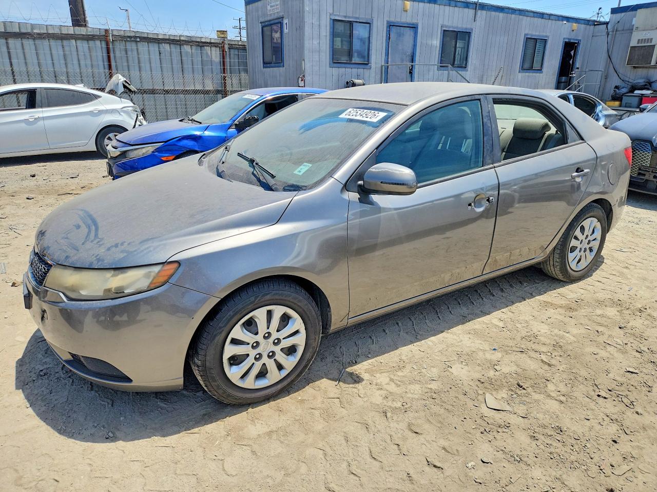 2011 Kia Forte EX, VIN KNAFU4A21B5439569 — Vandalism
