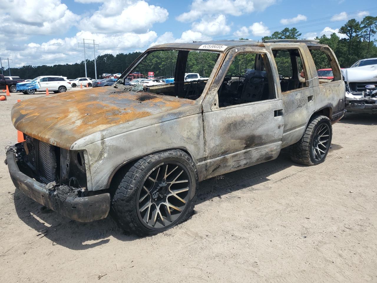 1997 GMC Yukon, VIN 1GKEK13R7VJ746693 — Burn