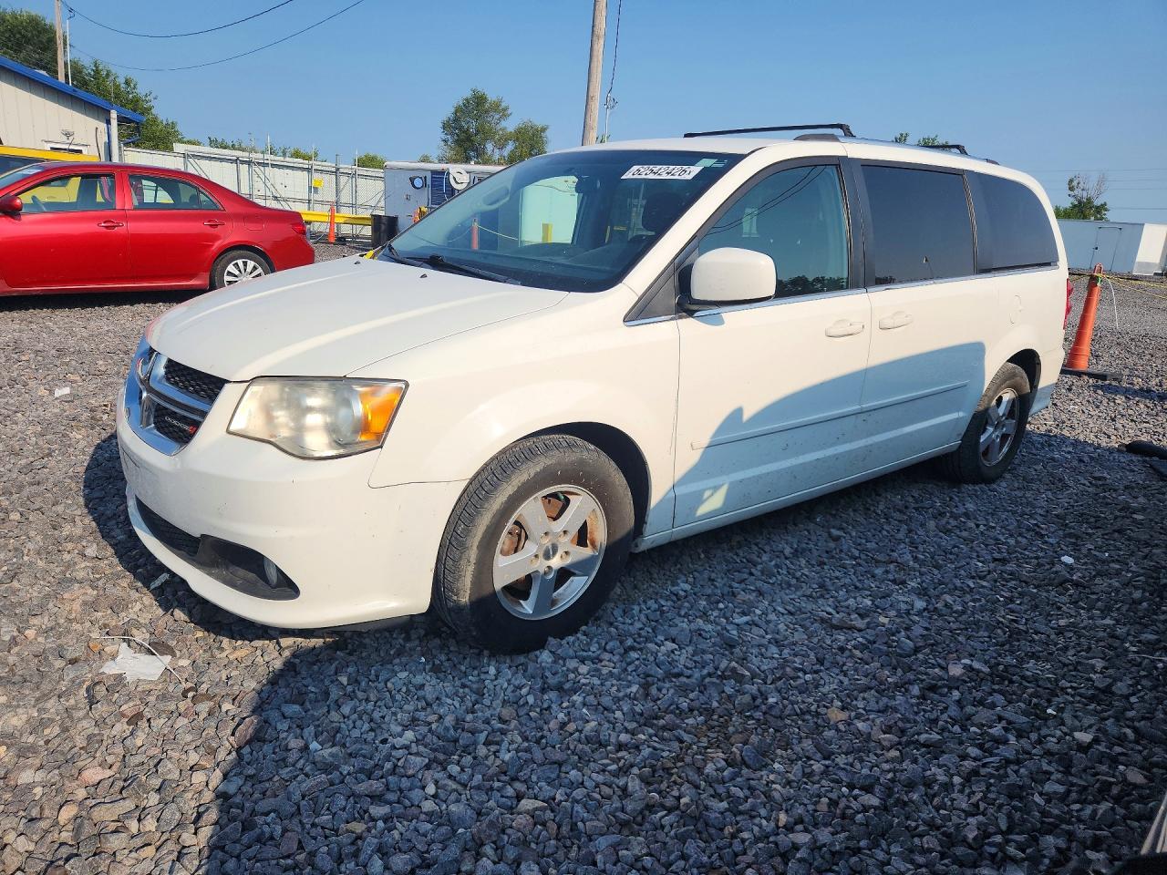 2011 Dodge Grand Caravan Crew, VIN 2D4RN5DG6BR700050 — Minor dents and scratches
