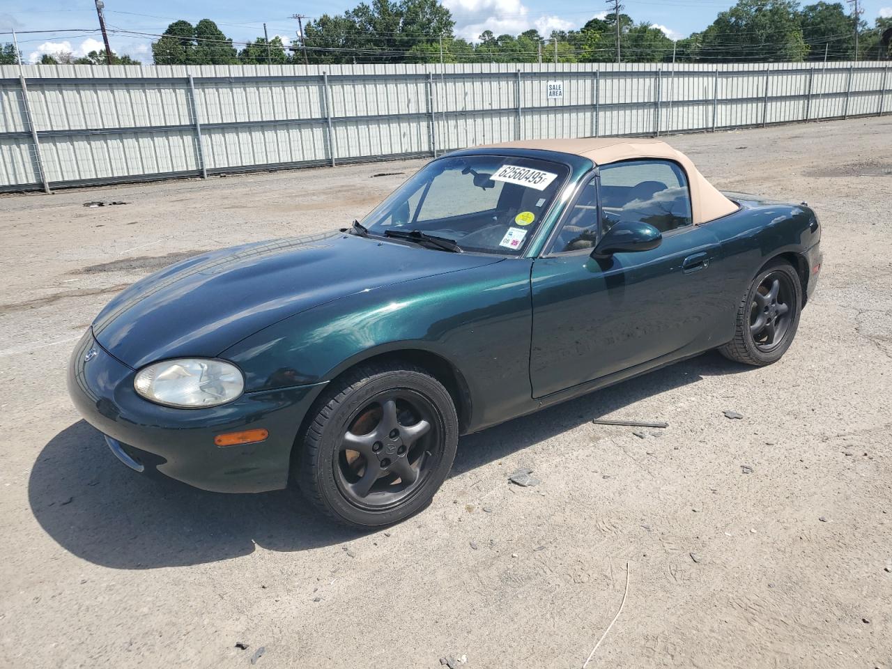1999 Mazda MX-5 Miata, VIN JM1NB3533X0130160 — Side