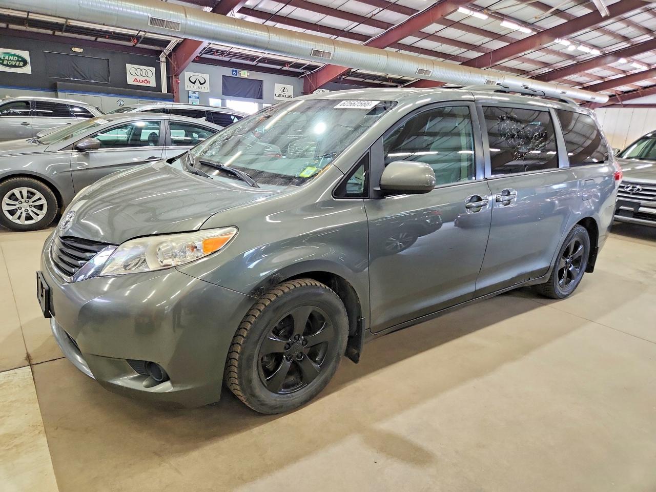 2012 Toyota Sienna LE, VIN 5TDKK3DC2CS277811 — Side