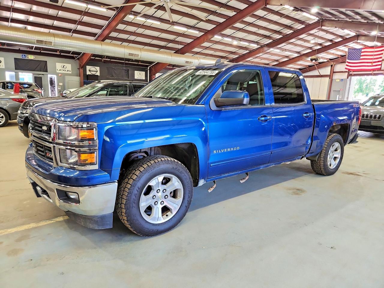 2015 Chevrolet Silverado 1500 LT, VIN 3GCUKREC3FG163331 — Side