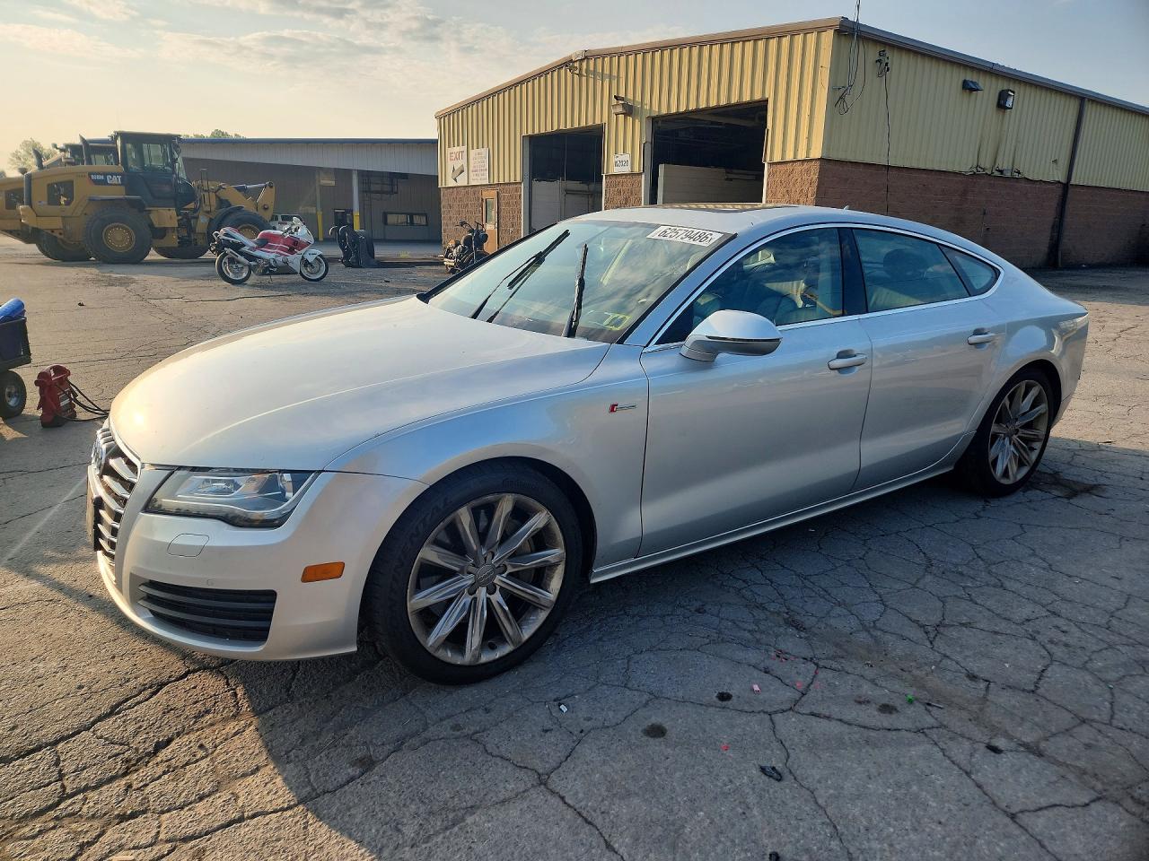 2012 Audi A7 Premium Plus, VIN WAUYGAFC1CN082668 — Side