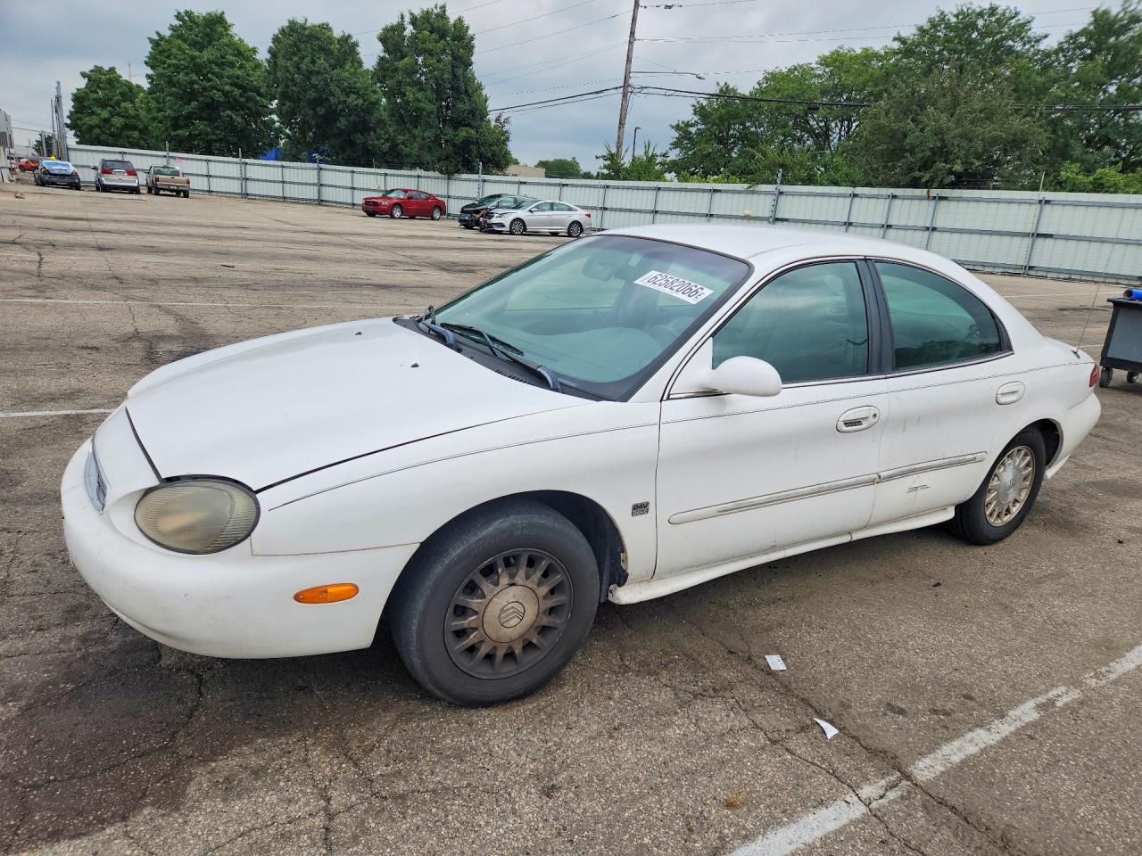 1999 Mercury Sable LS, VIN 1MEFM53S6XA613462 — Бок