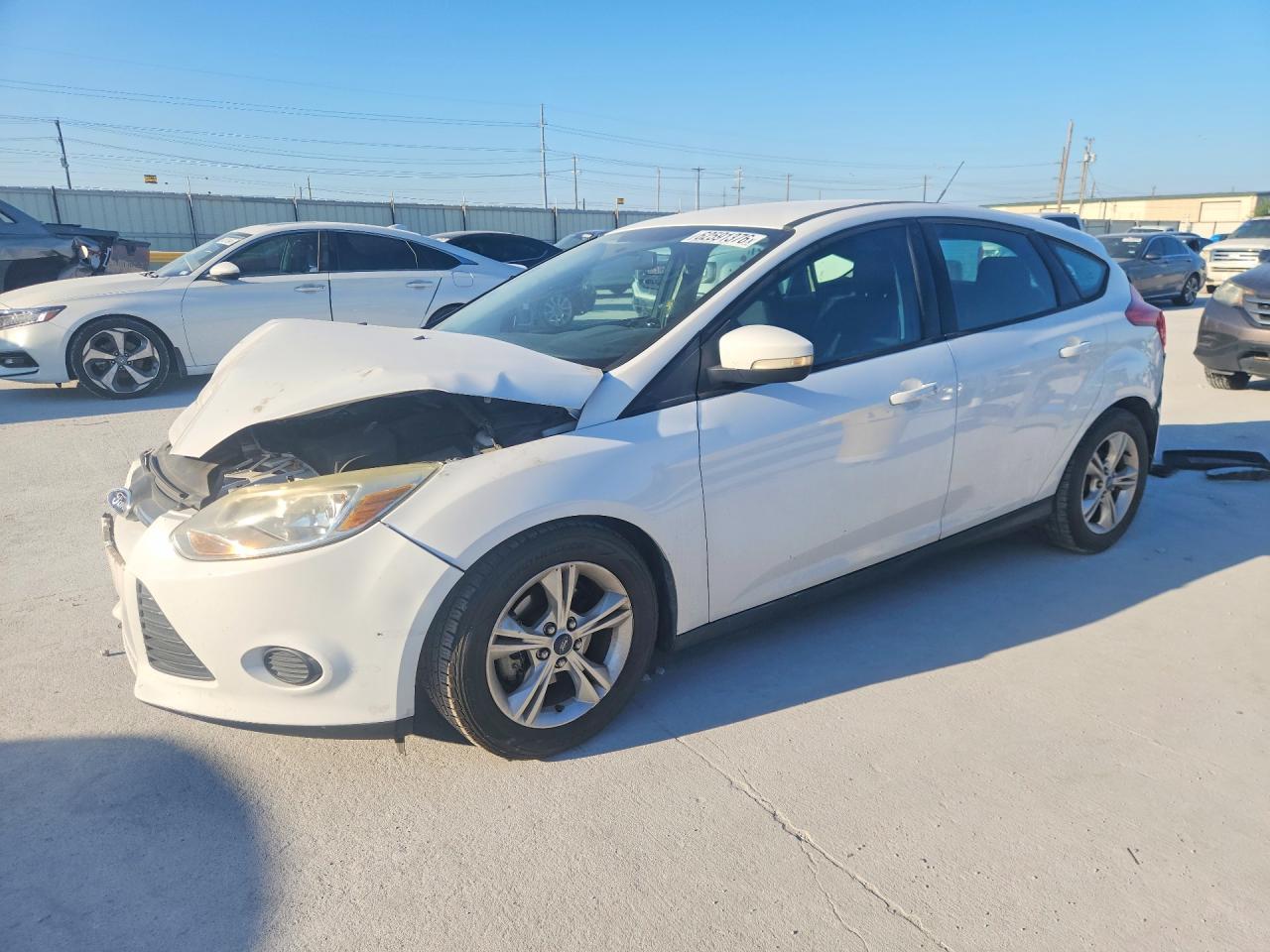 2013 Ford Focus SE, VIN 1FADP3K20DL189174 — Зад