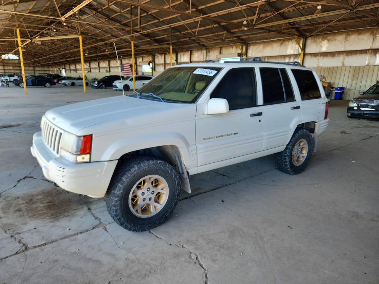 1998 Jeep Grand Cherokee Limited, VIN 1J4GZ78YXWC322296 — Minor dents and scratches