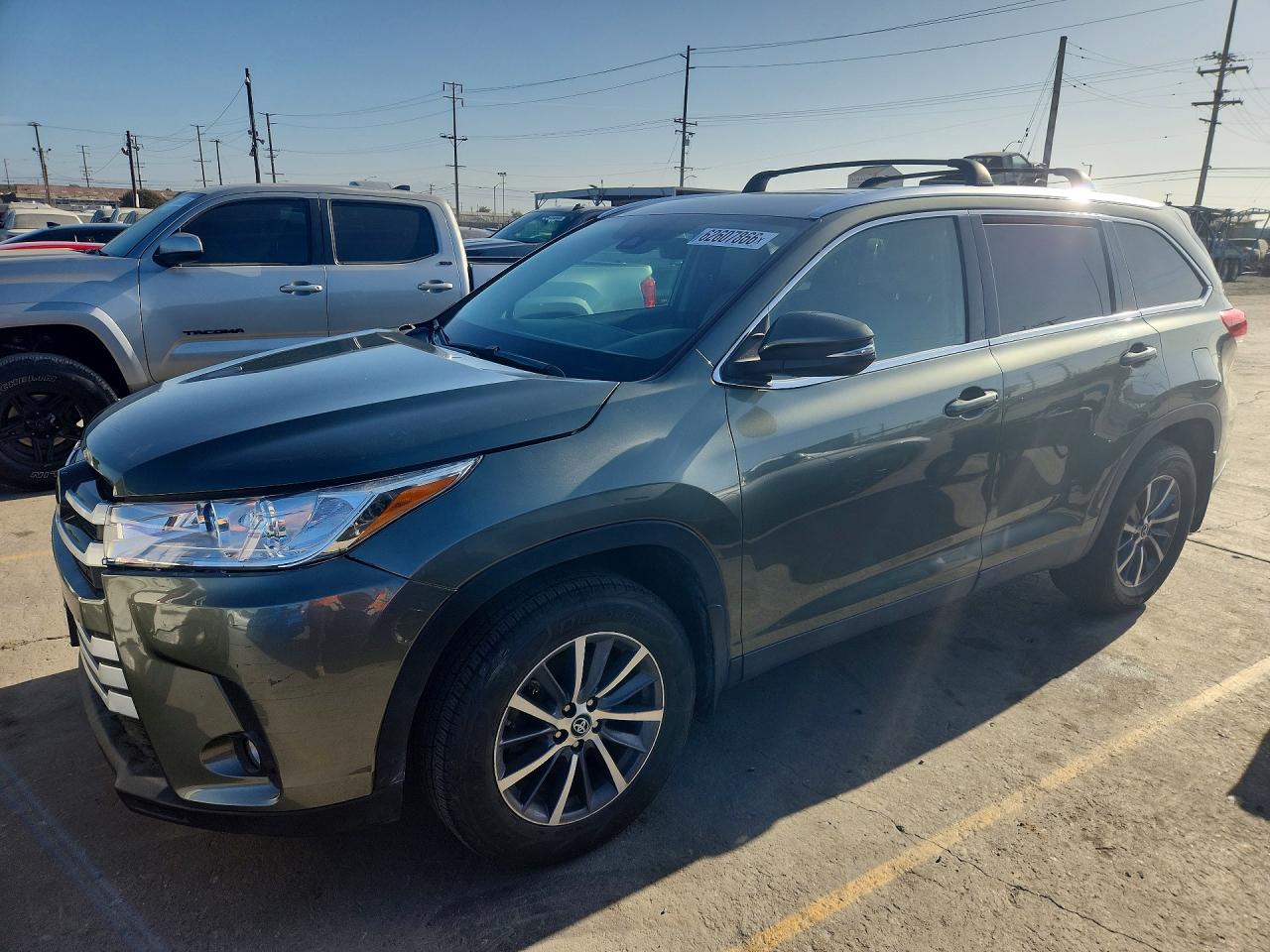2019 Toyota Highlander XLE, VIN 5TDJZRFH3KS940661 — Side