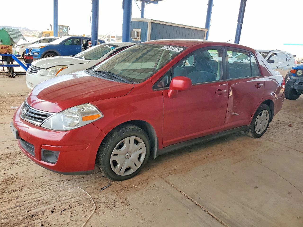 2010 Nissan Versa S, VIN 3N1BC1APXAL463367 — Side