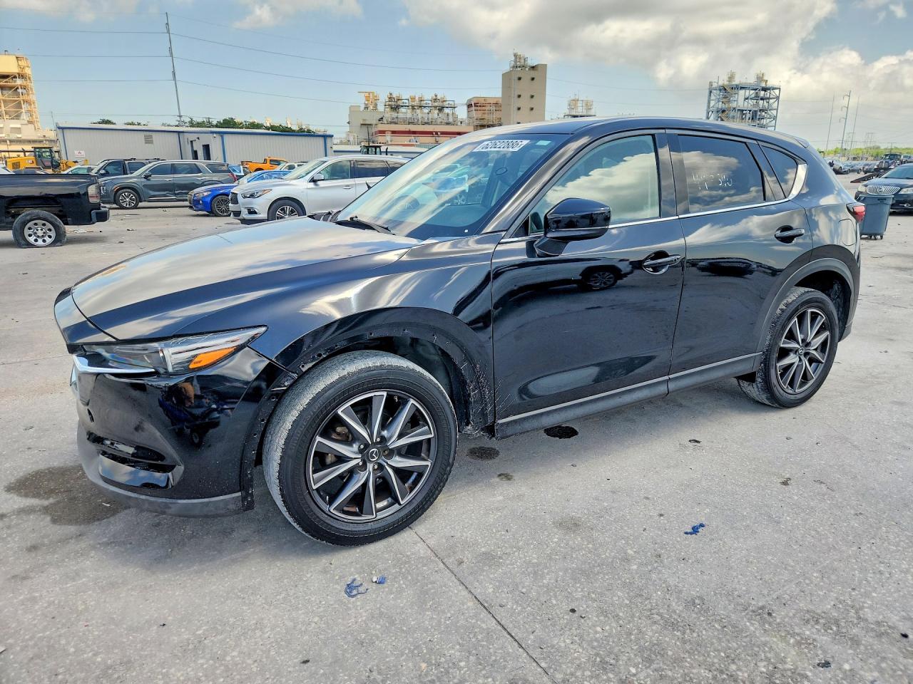 2019 Mazda CX-5 Grand Touring, VIN JM3KFADMXK0605146 — Side