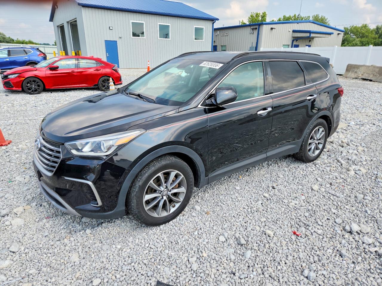 2017 Hyundai Santa Fe SE, VIN KM8SMDHF9HU209413 — Side